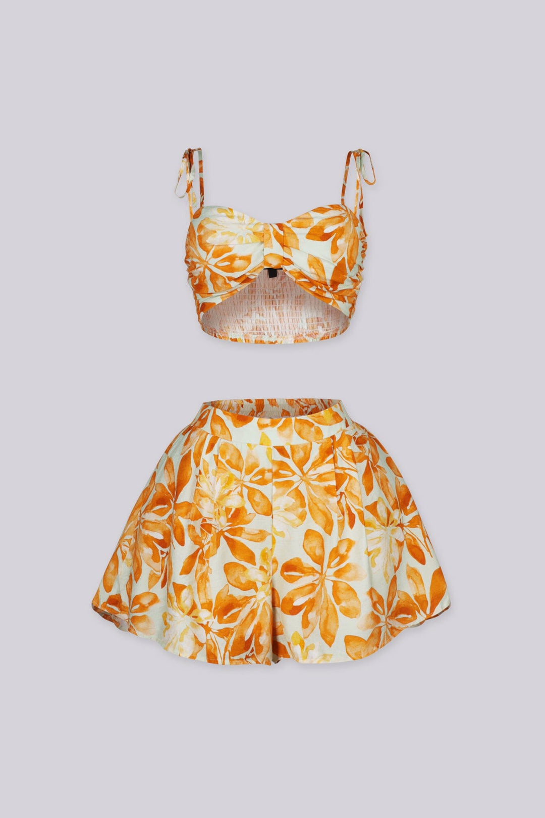 Floral print bra top with adjustable tie shoulder straps, Matching high rise loose fit shorts with an elasticized back waistband