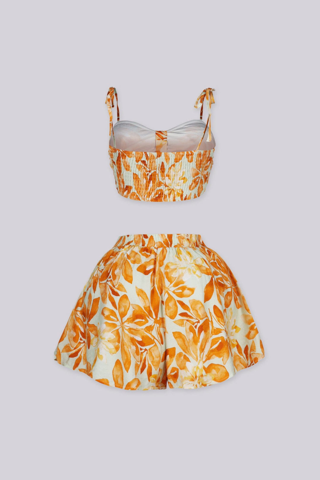 Floral print bra top with adjustable tie shoulder straps, Matching high rise loose fit shorts with an elasticized back waistband