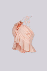 Chiffon ruffle halter neck crop top with 3D floral detail at the center bust
Featuring covered mini buttons at the back