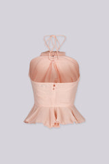 Chiffon ruffle halter neck crop top with 3D floral detail at the center bust
Featuring covered mini buttons at the back