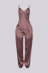 Satin lingerie inspired jumpsuit with thin straps featuring lace trimmed neckline and bodice