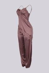 Satin lingerie inspired jumpsuit with thin straps featuring lace trimmed neckline and bodice