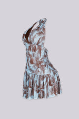 Mini dress featuring a plunging halter neckline with self tie strap, Ruched bodice that drops into a flared skirt
