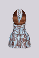 Mini dress featuring a plunging halter neckline with self tie strap, Ruched bodice that drops into a flared skirt