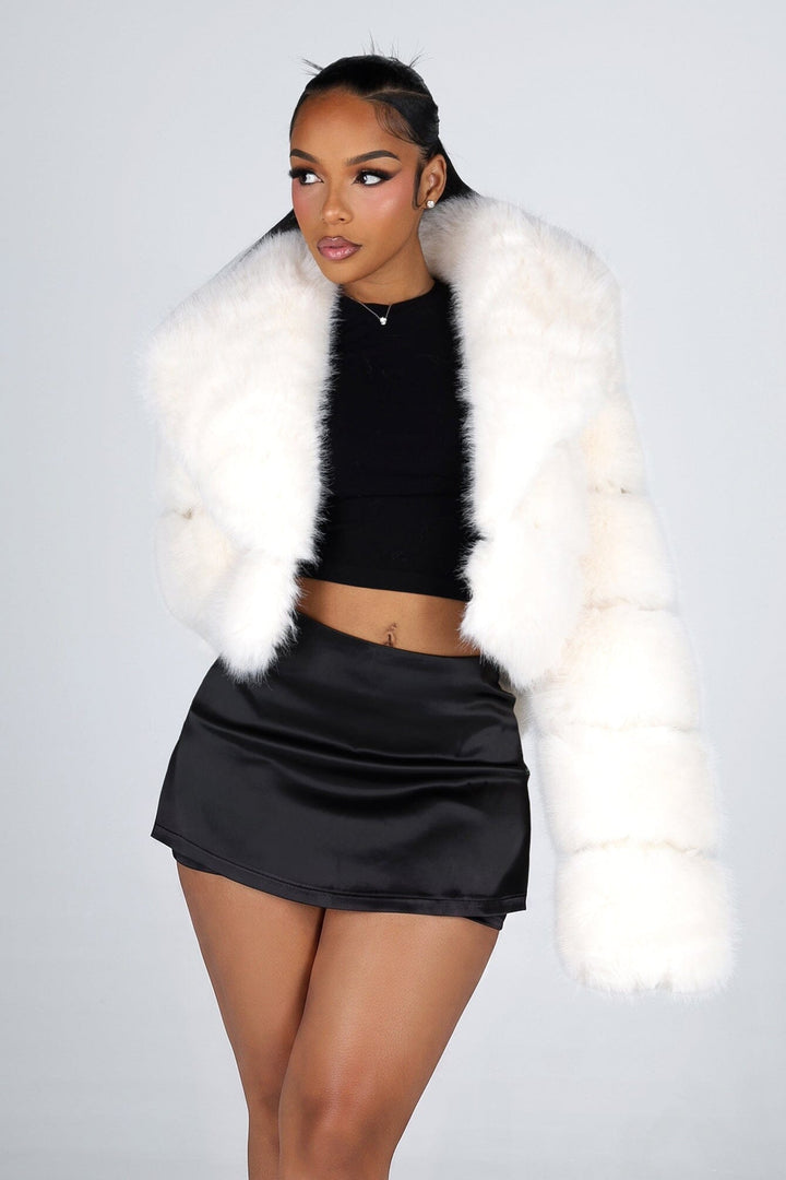 Cropped soft faux fur jacket with oversized shawl collar and paneled long sleeves