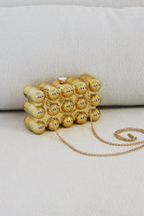EDGE — gold bubble-textured mini clutch with chain strap, front view flat lay