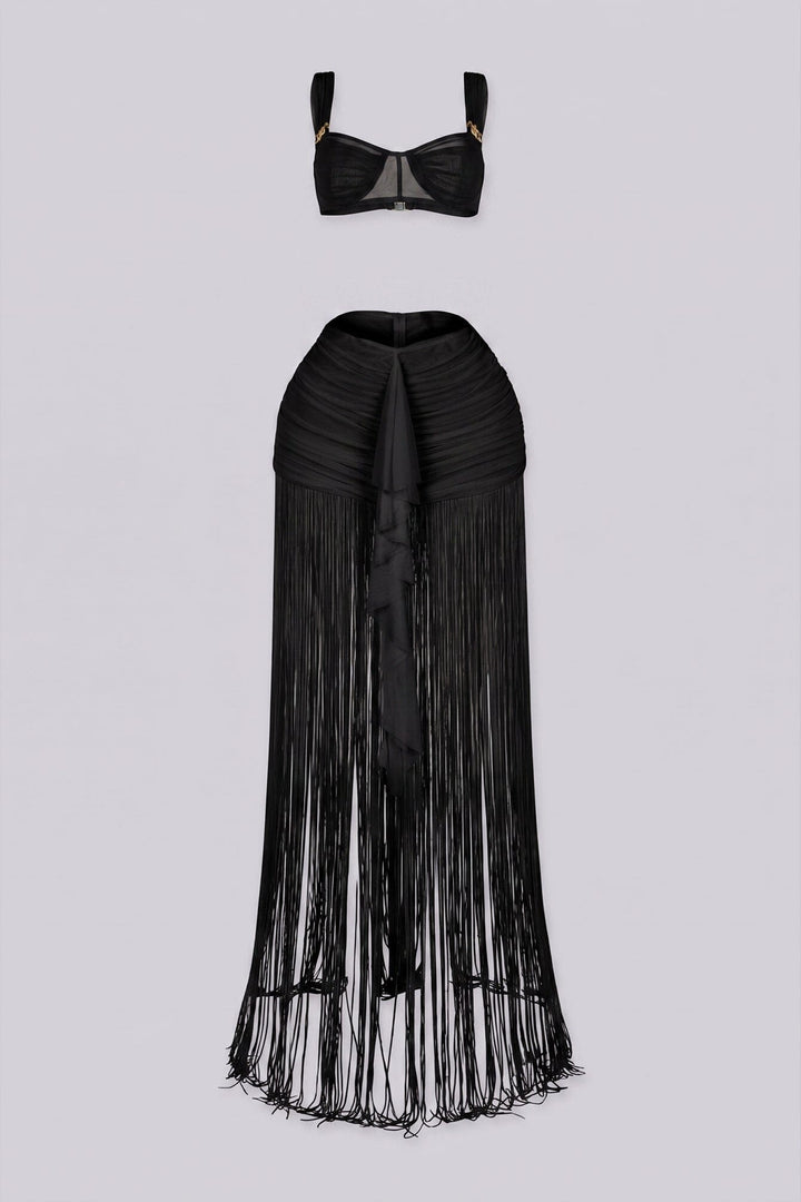 Bralette crop top featuring a gold hardware bralette,
Matching set with ruched mini skirt with floor length fringe
