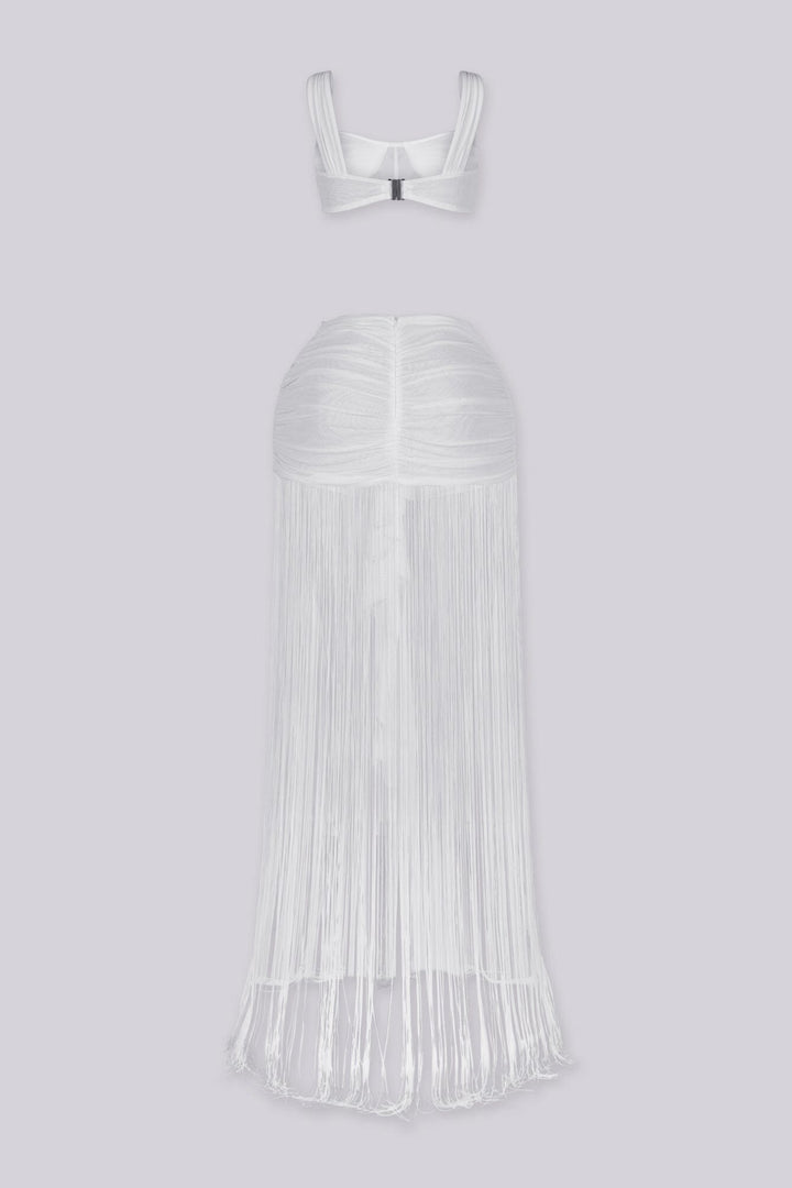 Bralette crop top featuring a gold hardware bralette,
Matching set with ruched mini skirt with floor length fringe