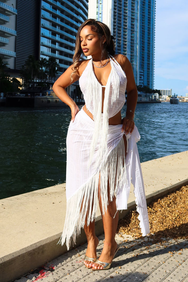 Fringe hem deep V neckline halter top,
Matching asymmetric cover up skirt