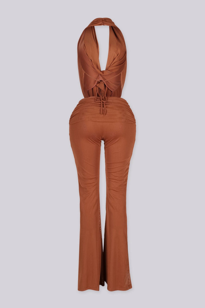 Sleeveless plunging cowl neckline halter top that drapes low with fluid movement