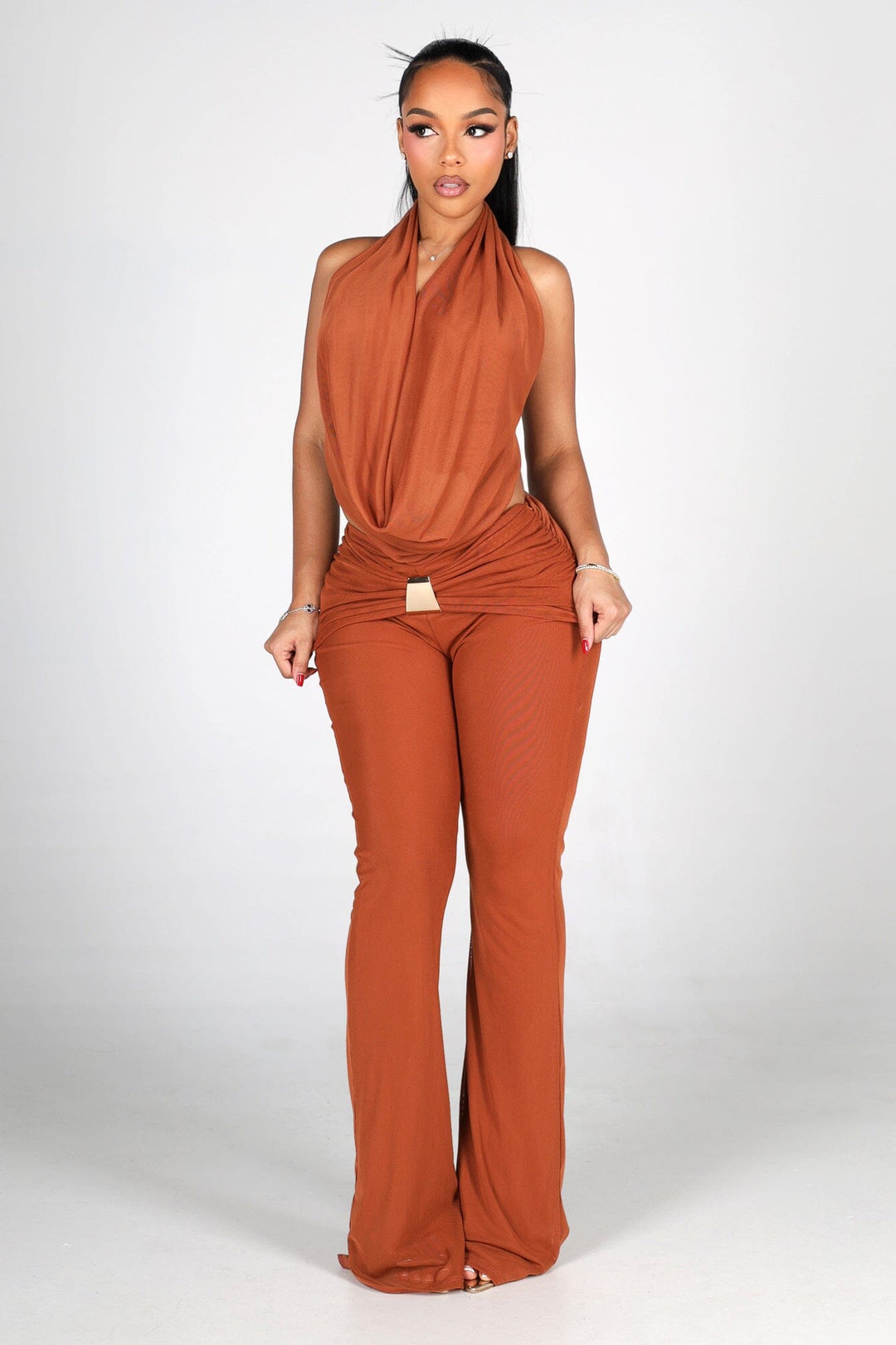 Sleeveless plunging cowl neckline halter top that drapes low with fluid movement
