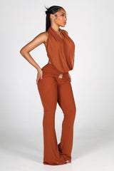 Sleeveless plunging cowl neckline halter top that drapes low with fluid movement