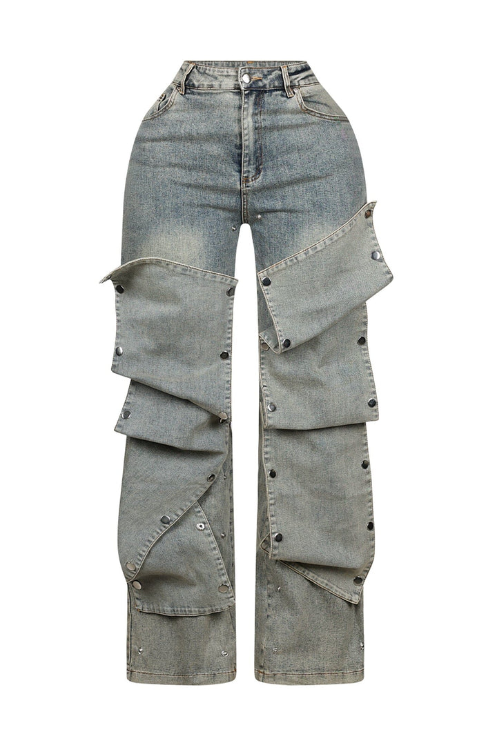 High waist wide leg jeans featuring multiple overlapping fabric flaps with metallic snap buttons