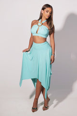 Halter bra top with sculptural metal trim and flowy pixie skirt with an asymmetrical hemline