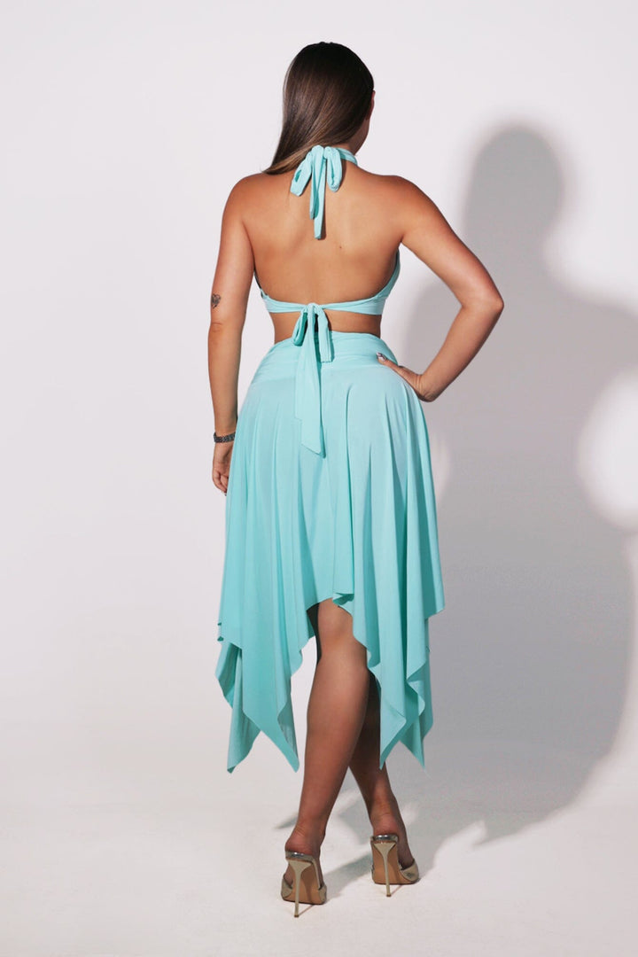Halter bra top with sculptural metal trim and flowy pixie skirt with an asymmetrical hemline