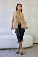 Faux leather capri pants featuring adjustable lace up ties and zipper details at sides