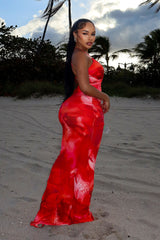 Padded halter maxi dress in abstract floral print
Ruched draping with crisscross open back detail