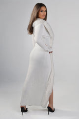 Maxi length ribbed knit sweater with oversized faux fur collar and trim down the front