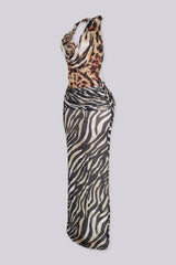 Animal print halter maxi dress featuring plunging draped cowl neckline with ruched fitted bodice