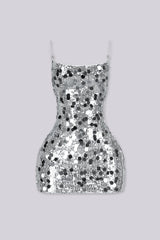 Fitted mini dress covered in oversized paillette sequins throughout with thin adjustable spaghetti straps
