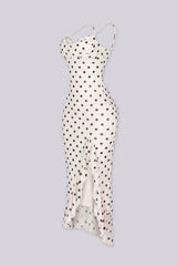 EDGE — ivory polka dot print midi dress with ruffle hem, side view flat lay
