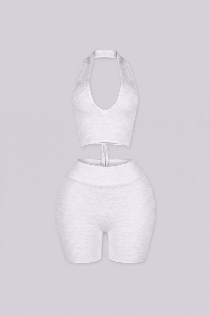 Jacquard halter neckline with adjustable crisscross ties at center back