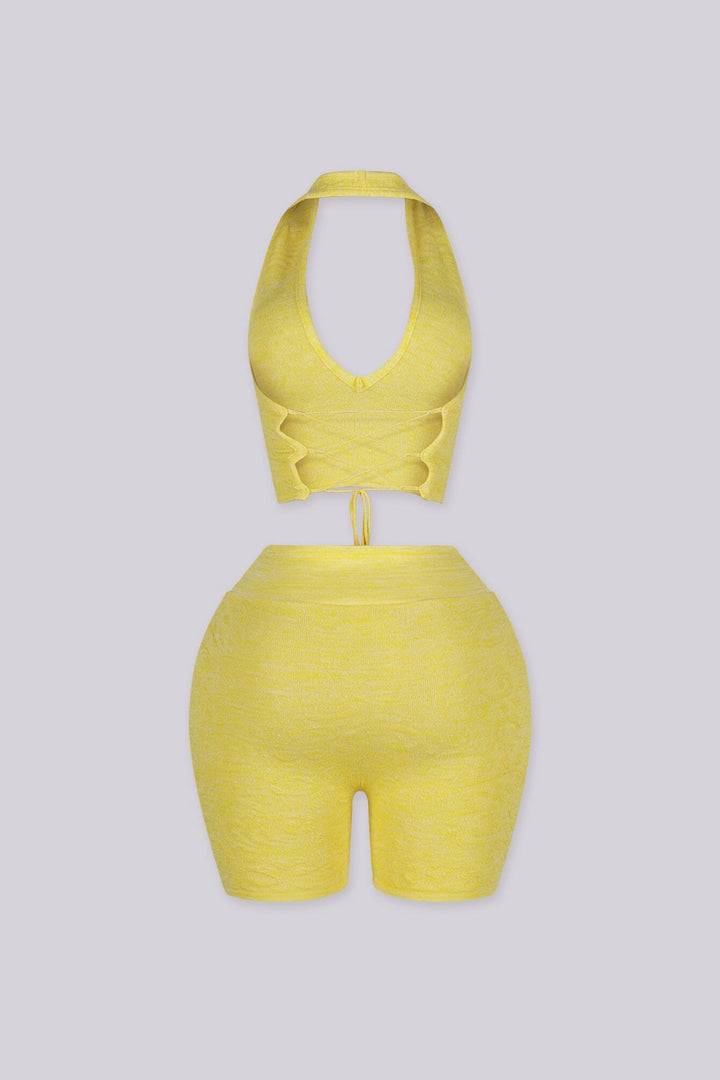 Jacquard halter neckline with adjustable crisscross ties at center back