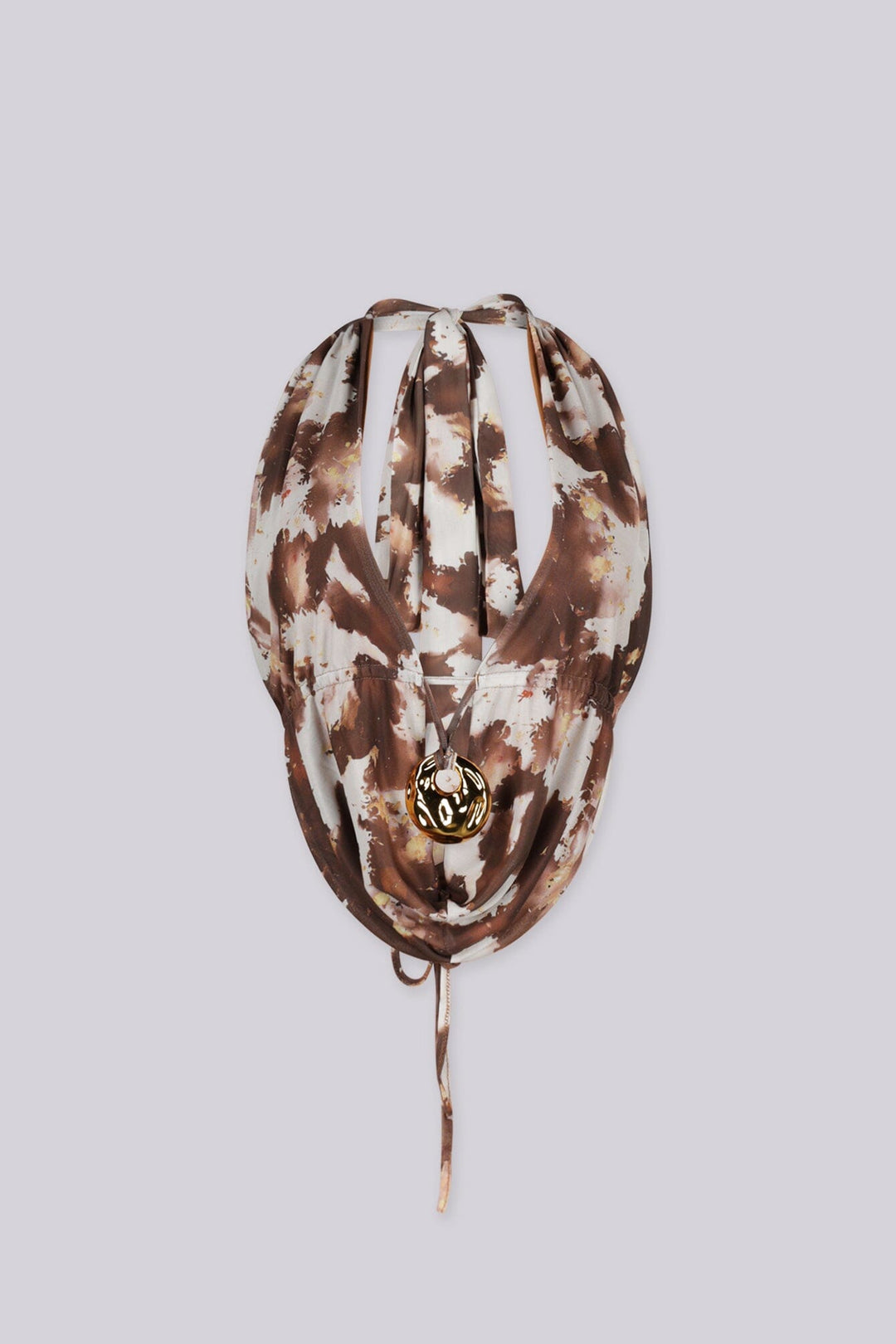 Deep plunging halter top with gold ring hardware at the center