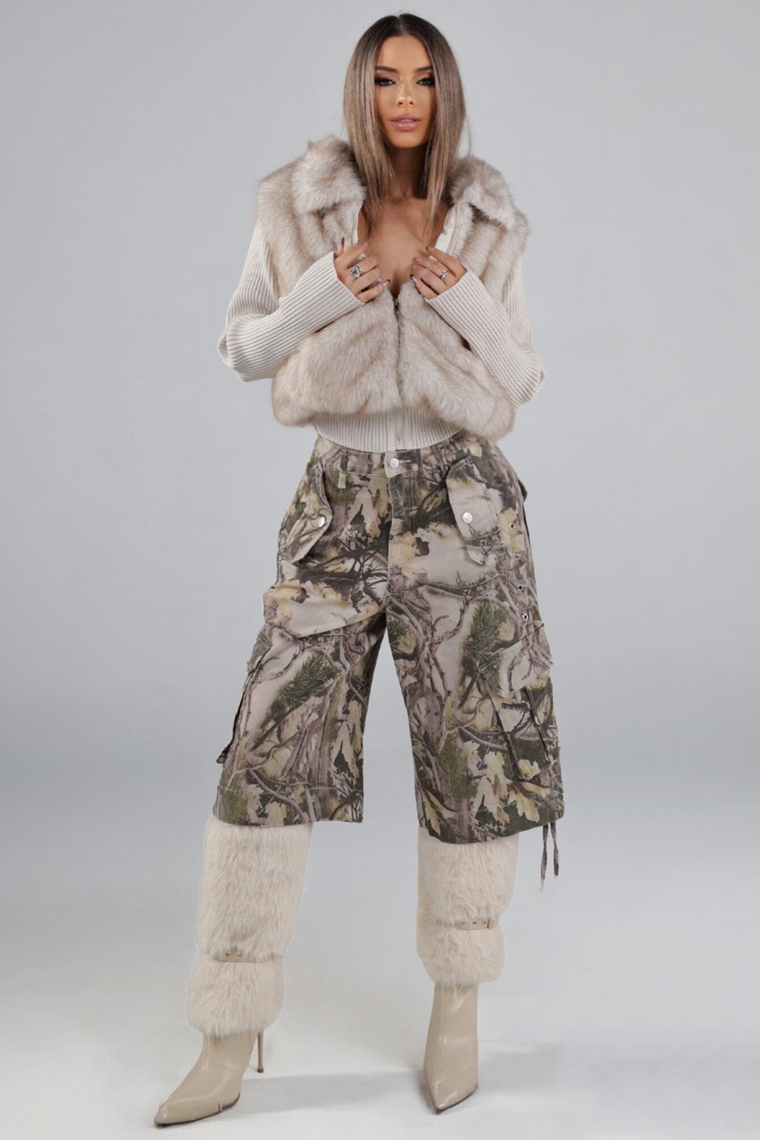High rise relaxed fit bermuda pants in an allover tree camouflage print