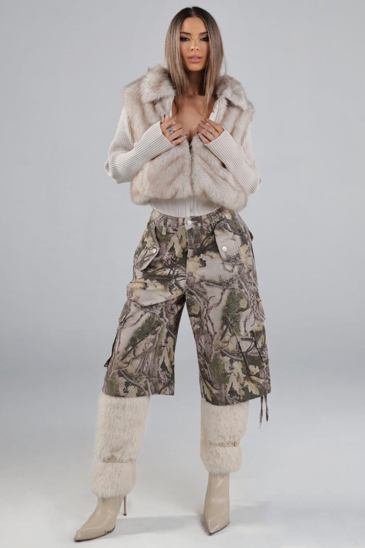 High rise relaxed fit bermuda pants in an allover tree camouflage print