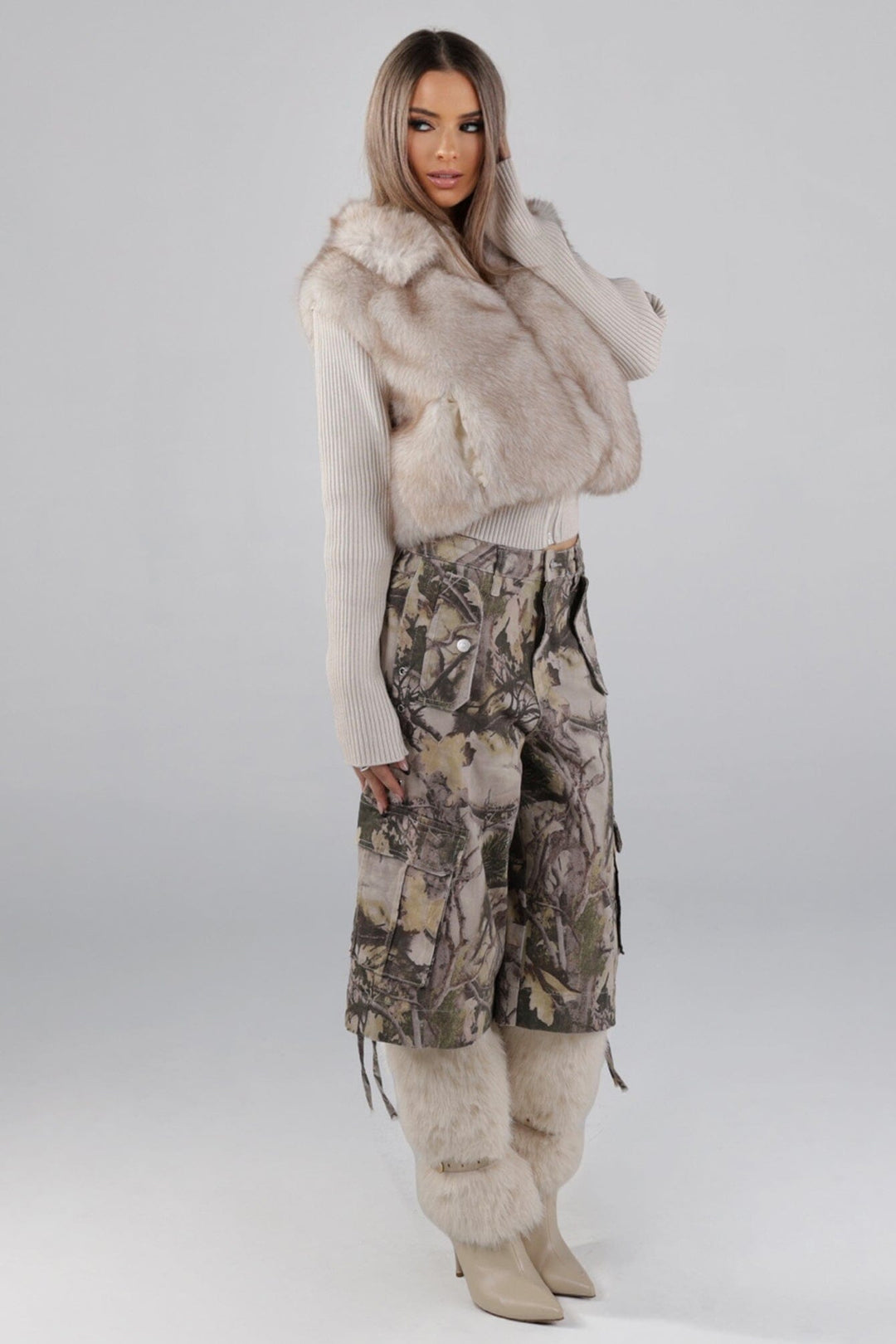 High rise relaxed fit bermuda pants in an allover tree camouflage print