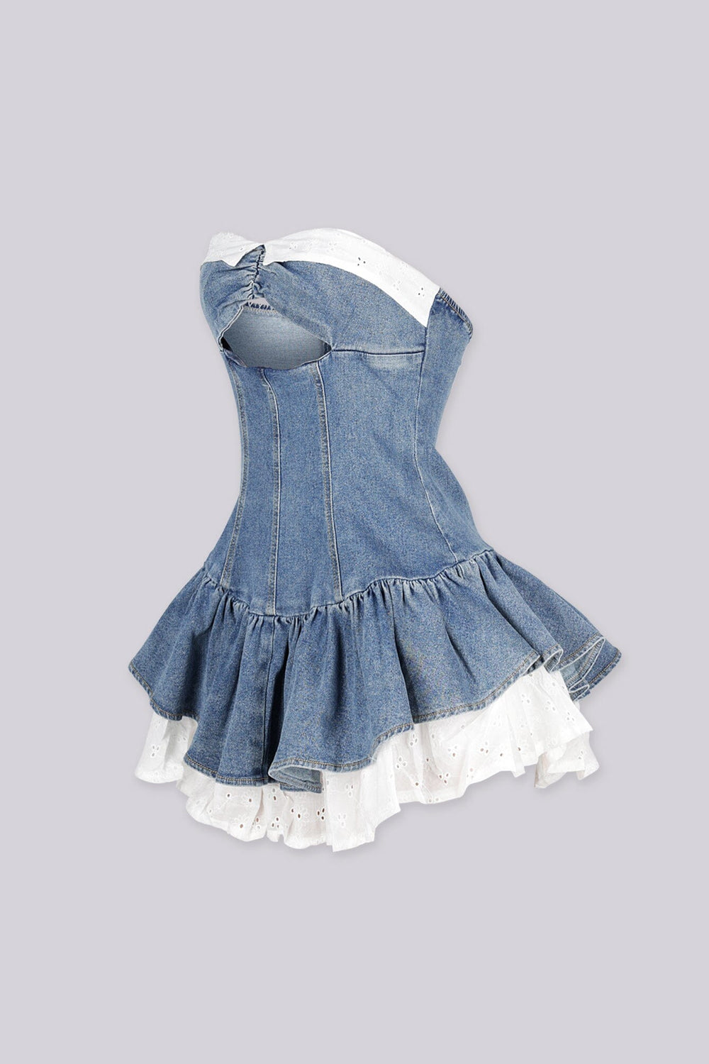 Denim tube dress with a keyhole cutout, side view.