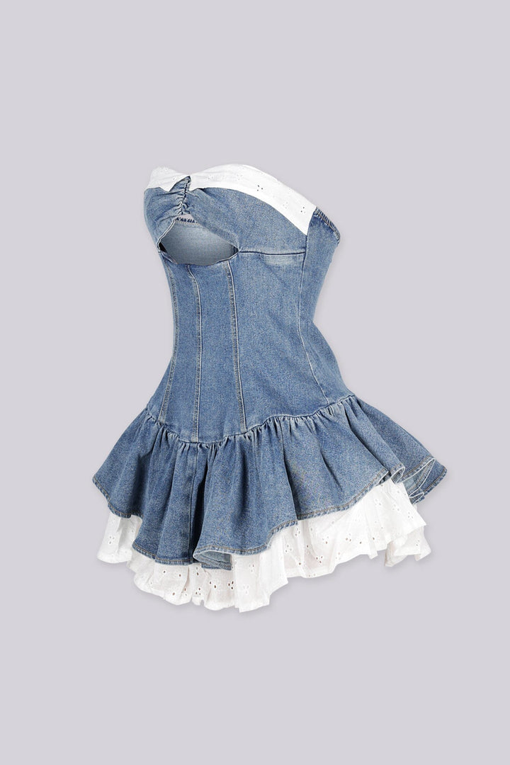 Denim tube dress with a keyhole cutout, side view.