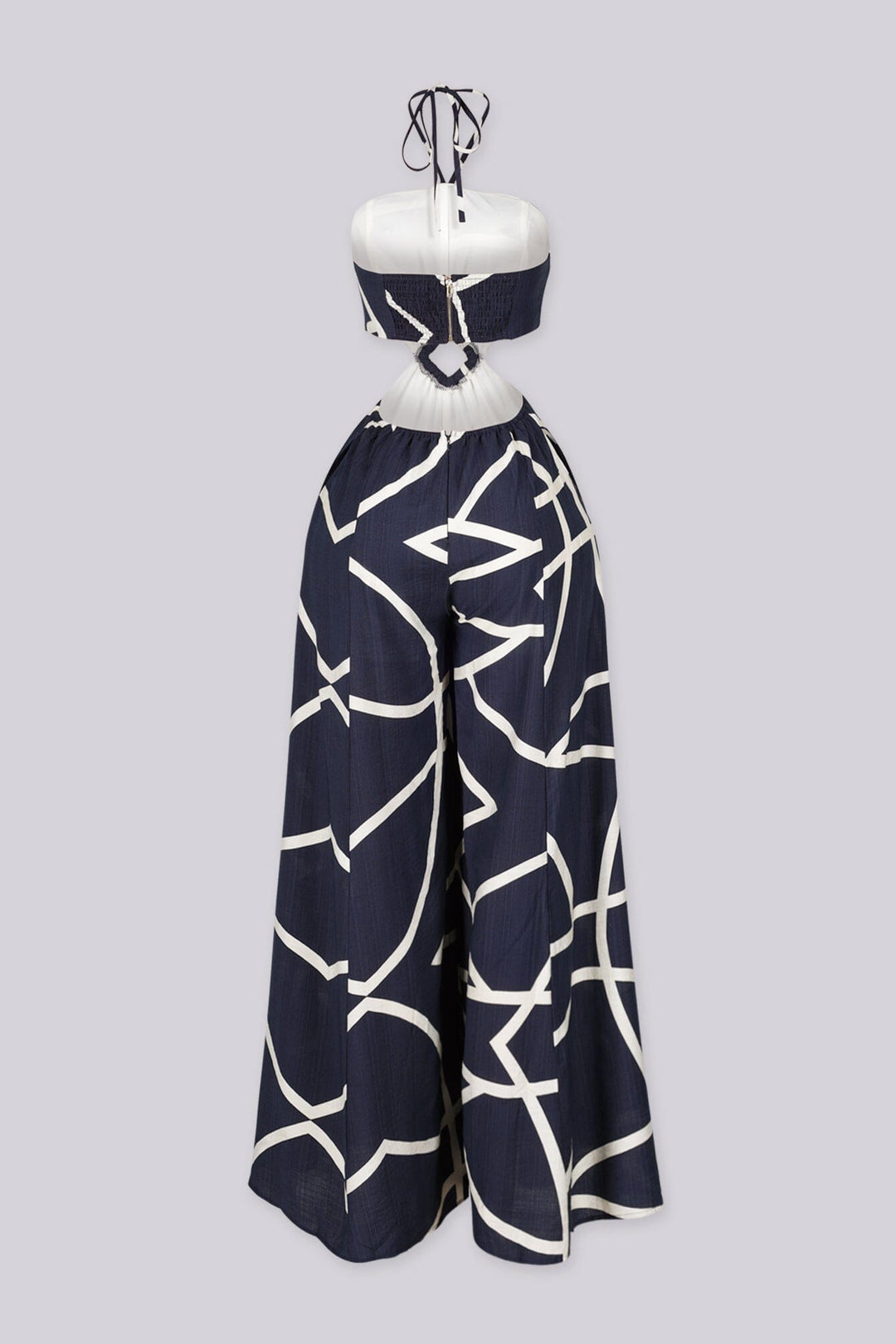 Linen abstract print wide leg halter jumpsuit featuring cutout waist with a square detail at the center