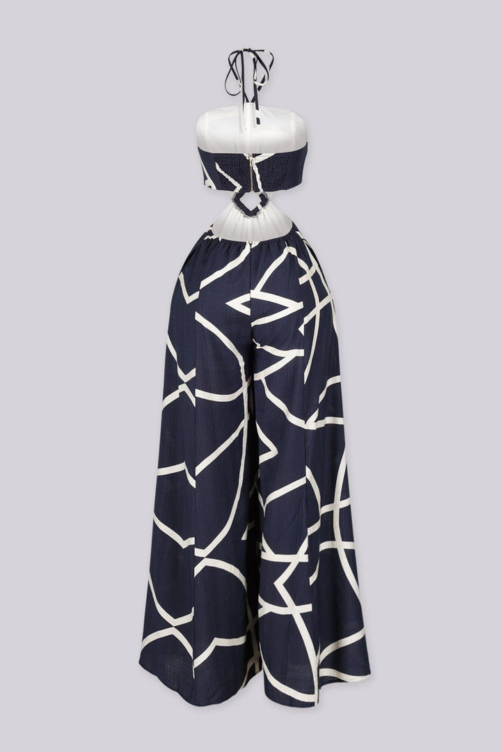 Linen abstract print wide leg halter jumpsuit featuring cutout waist with a square detail at the center