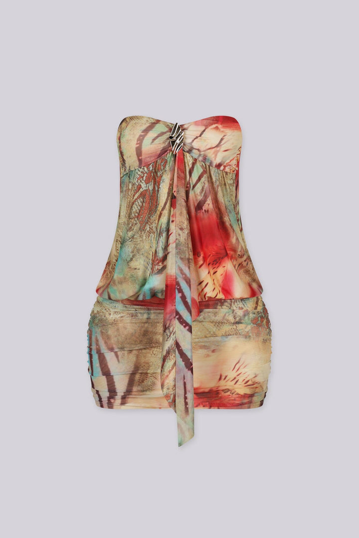 Abstract print tube mini dress featuring draped front detail with a metal accent and subtle volume through the waist