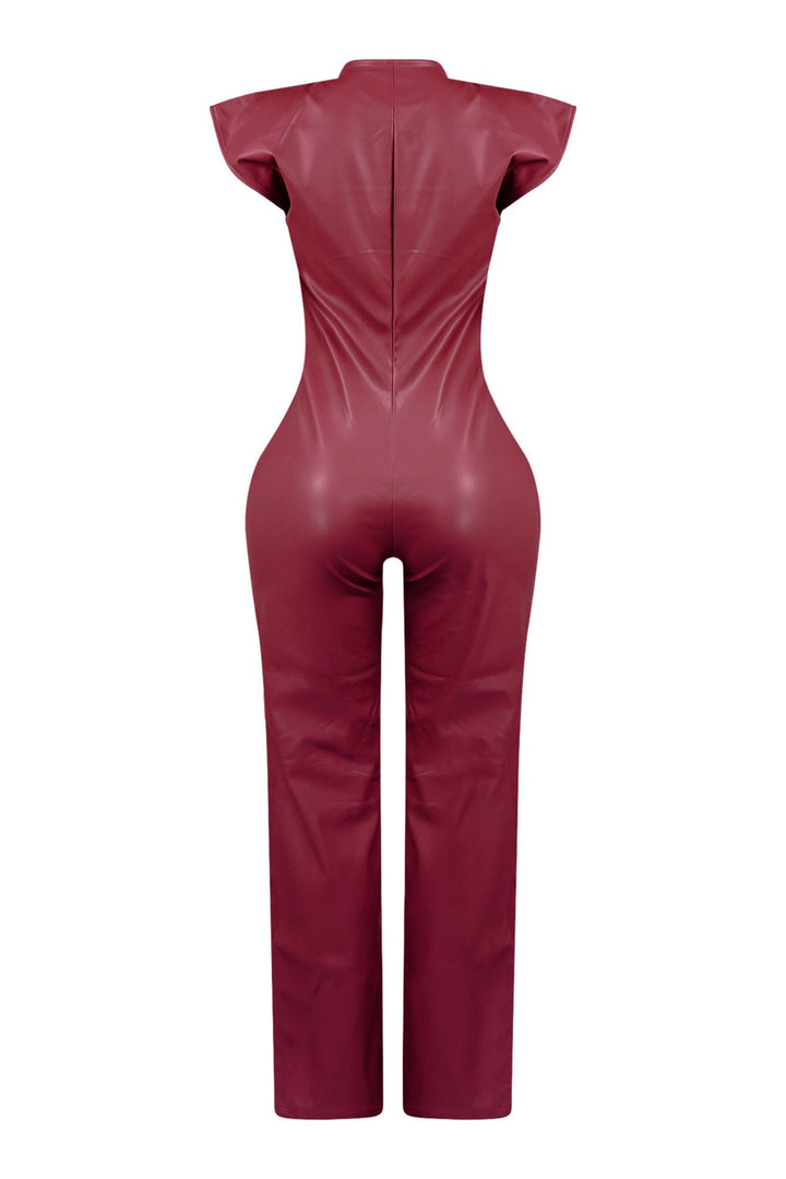 Wide leg sleeveless faux leather jumpsuit featuring seamed construction bodice and button down closure