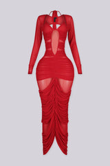 Long sleeve maxi dress with halter neckline and plunging bust featuring sheer cutout panels