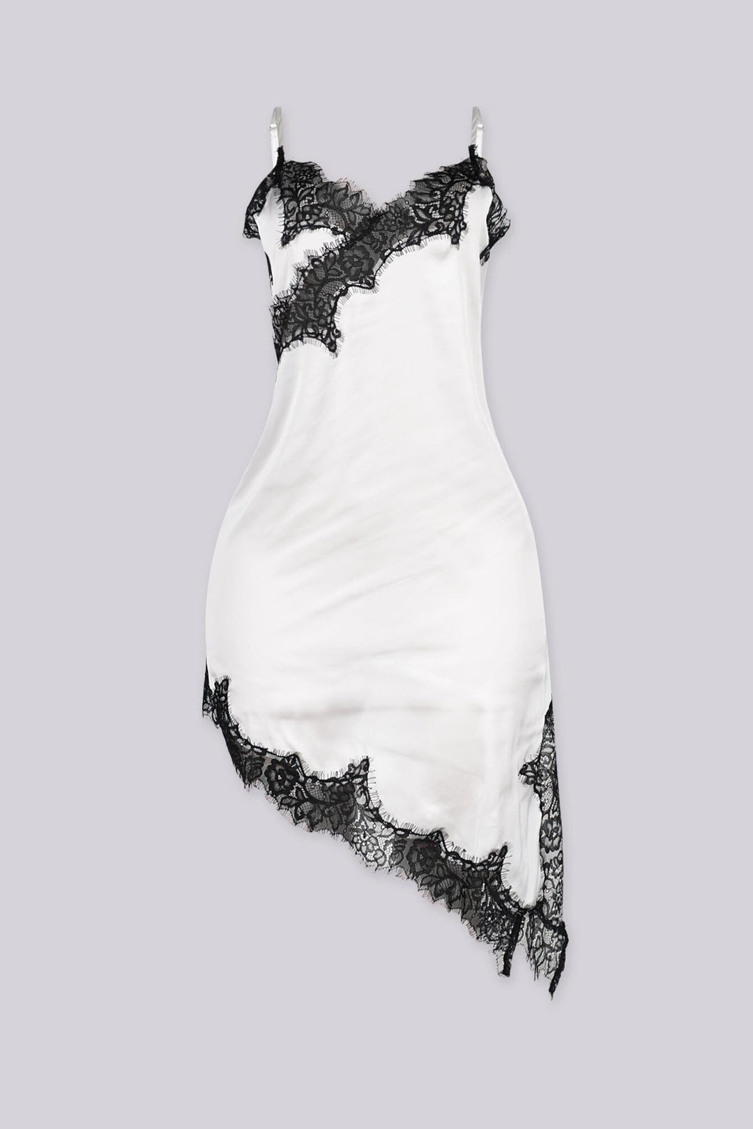 Asymmetrical hemline mini dress with v neckline and spaghetti straps featuring black lace trim