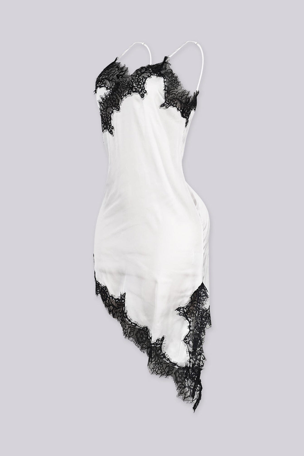 Asymmetrical hemline mini dress with v neckline and spaghetti straps featuring black lace trim
