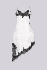 Asymmetrical hemline mini dress with v neckline and spaghetti straps featuring black lace trim