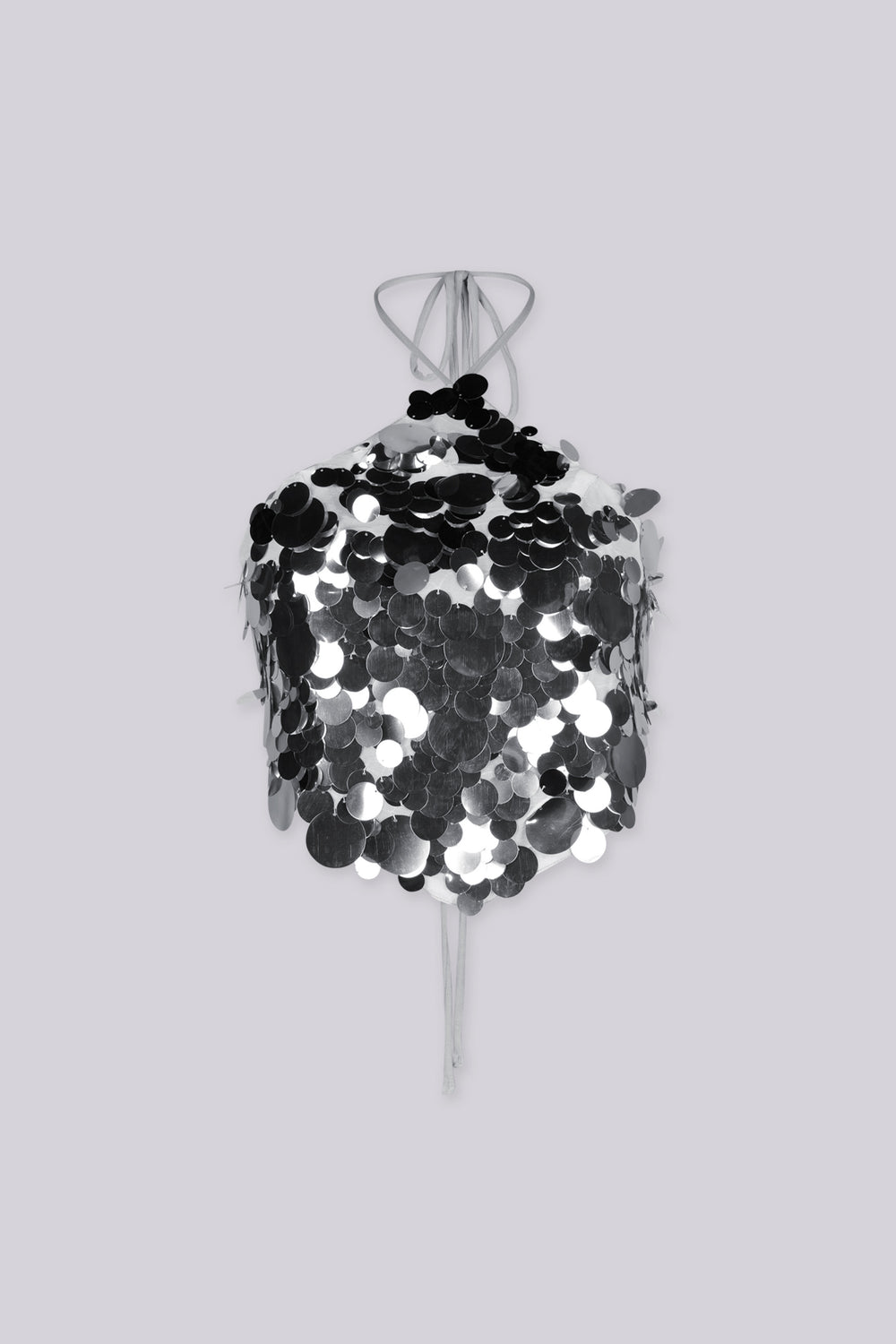 Triangle halter top with thin adjustable spaghetti straps featuring oversized paillette disc sequins cascade across the entire front