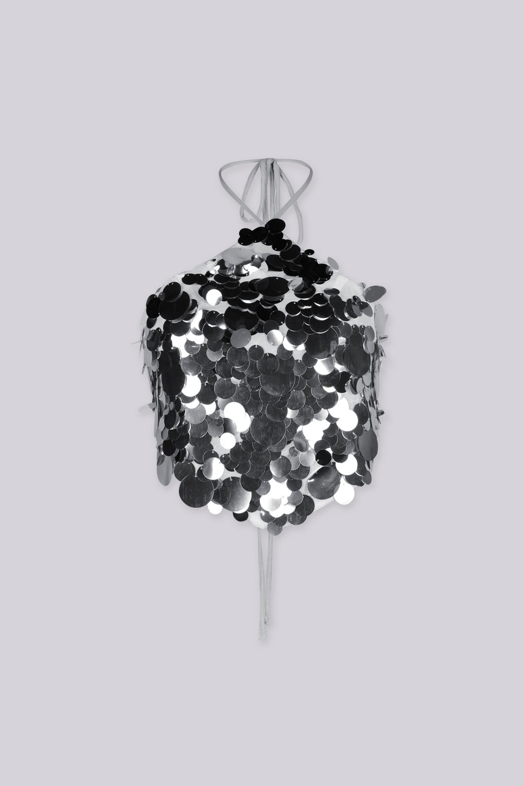 Triangle halter top with thin adjustable spaghetti straps featuring oversized paillette disc sequins cascade across the entire front