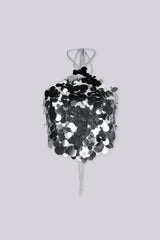 Triangle halter top with thin adjustable spaghetti straps featuring oversized paillette disc sequins cascade across the entire front