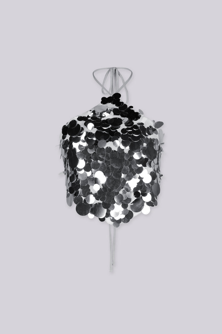Triangle halter top with thin adjustable spaghetti straps featuring oversized paillette disc sequins cascade across the entire front