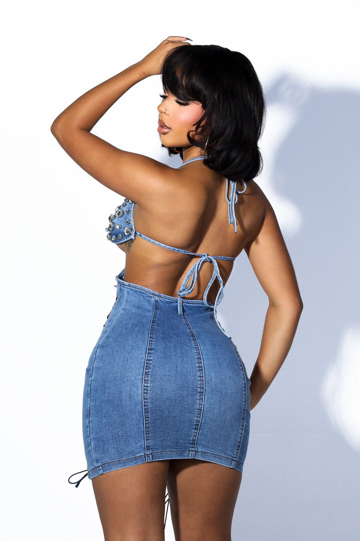 Denim mini dress with rhinestone embellished bra top with adjustable straps at the nape and back