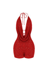 Deep plunging halter mini romper with draped cowl neck overlay and small strap connector featuring scatter shimmering beads