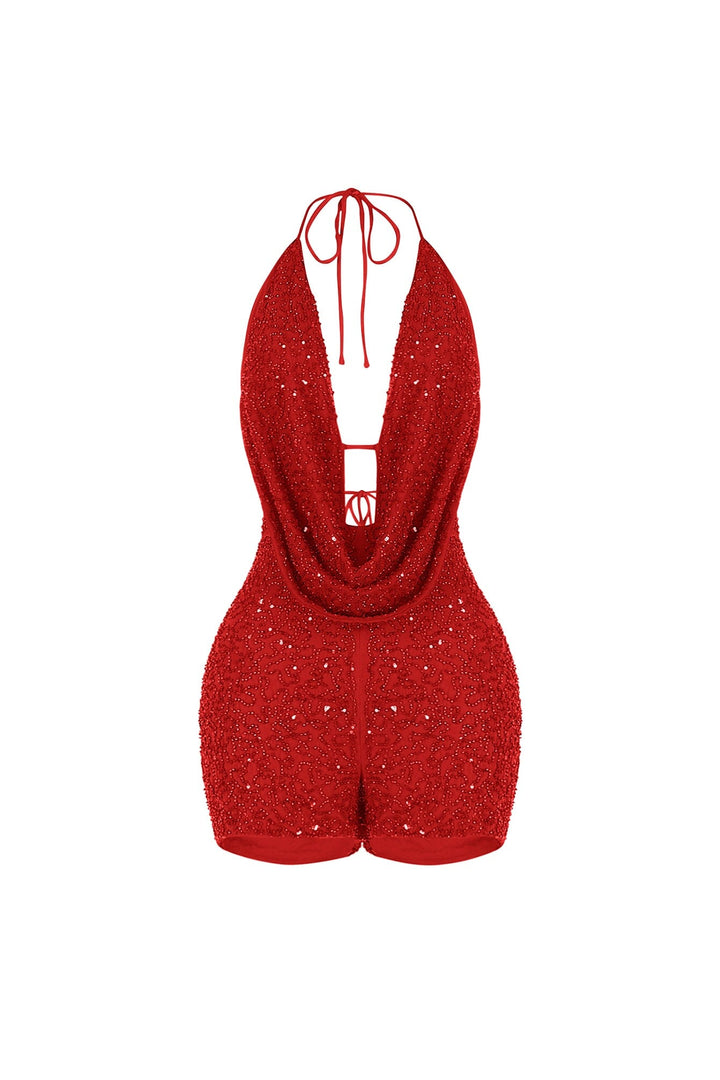 Deep plunging halter mini romper with draped cowl neck overlay and small strap connector featuring scatter shimmering beads