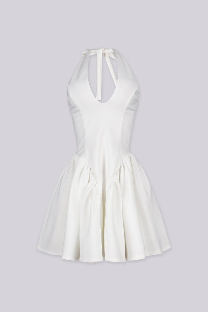 Fitted bodice halter neck mini dress with plunging v neckline featuring drop waist seams for flared swing hem