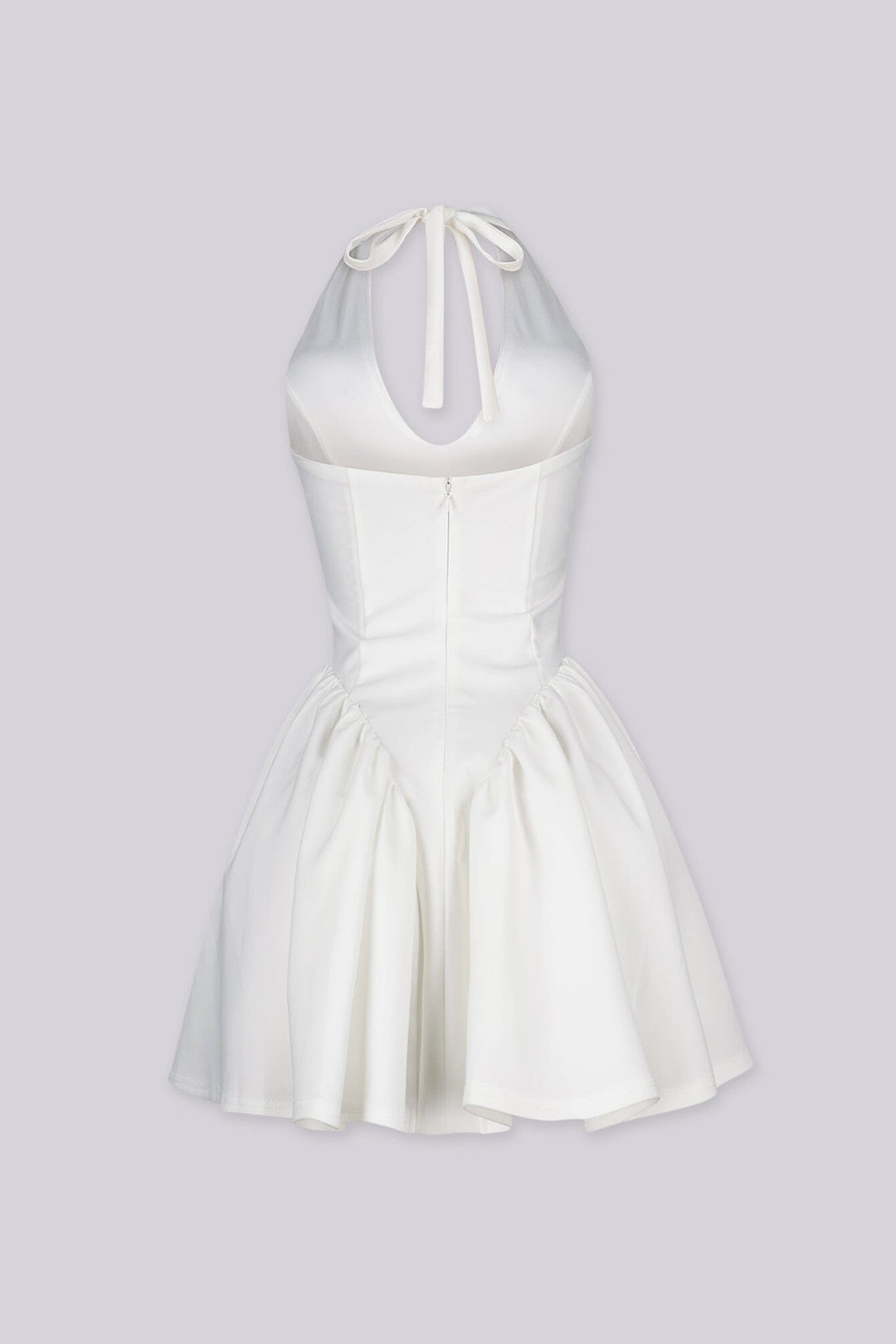 Fitted bodice halter neck mini dress with plunging v neckline featuring drop waist seams for flared swing hem